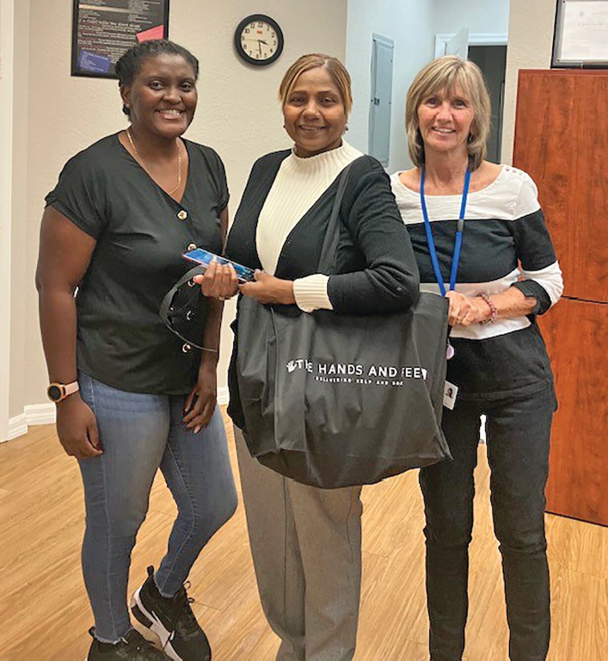 Left to right: Kenyetta Louis - licensing coordinator for cckids, caregiver Debbie Gangaram and Rose Bailey - kinship navigator.